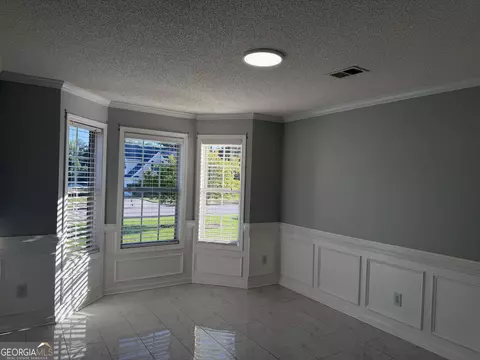 Living - 152 Moss Pointe Dr, Mcdonough, GA 30253 photo 4 of 4