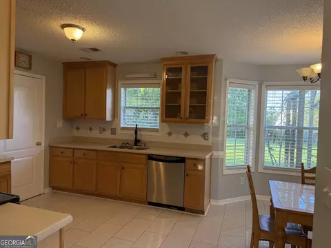 Kitchen - 152 Moss Pointe Dr, Mcdonough, GA 30253 photo 2 of 2