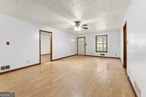 Living - 212 Farmbrook Pkwy E, Stockbridge, GA 30281 photo 3 of 5