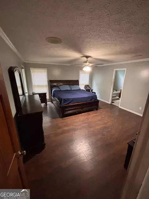 Bedroom - 10992 Twelve Oaks Ct, Hampton, GA 30228 photo 2 of 4