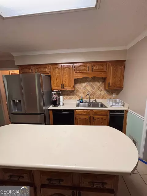 Kitchen - 10992 Twelve Oaks Ct, Hampton, GA 30228 photo 4 of 5