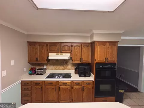 Kitchen - 10992 Twelve Oaks Ct, Hampton, GA 30228 photo 2 of 5
