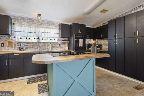 Kitchen - 115 Gose Rd, Forsyth, GA 31029 photo 4 of 6