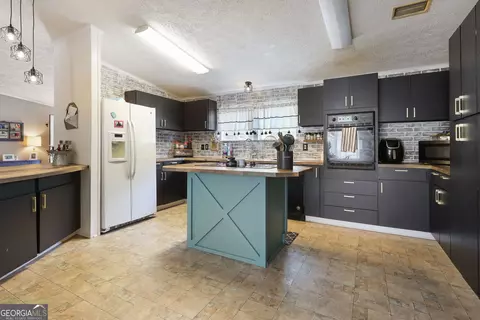 Kitchen - 115 Gose Rd, Forsyth, GA 31029 photo 3 of 6