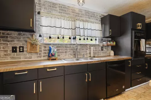 Kitchen - 115 Gose Rd, Forsyth, GA 31029 photo 5 of 6