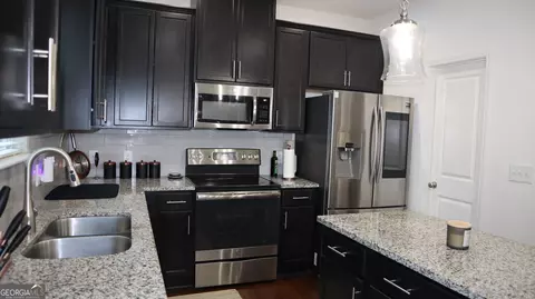 Kitchen - 2710 Kemp Ct, Conyers, GA 30094 photo 2 of 2