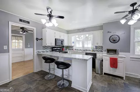 Kitchen - 48 Brewer Rd, Kingston, GA 30145 photo 3 of 6