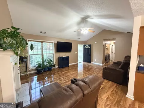 Living - 334 Evans Rd, Milner, GA 30257 photo 2 of 2