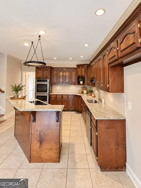 Kitchen - 865 Streamside Dr, Mcdonough, GA 30252 photo 3 of 3