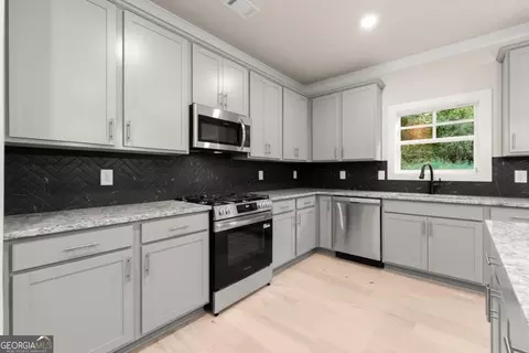 Kitchen - 4306 Brookhaven Dr SE, Covington, GA 30014 photo 4 of 5