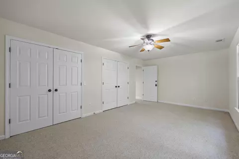 Bedroom - 5545 Stoneleigh Dr, Suwanee, GA 30024 photo 5 of 5