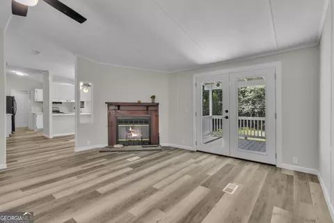 Living - 460 Etheridge Mill Rd, Milner, GA 30257 photo 3 of 5