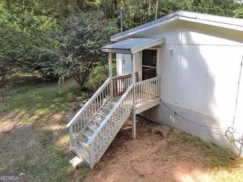 Exterior - 460 Etheridge Mill Rd, Milner, GA 30257 photo 12 of 16