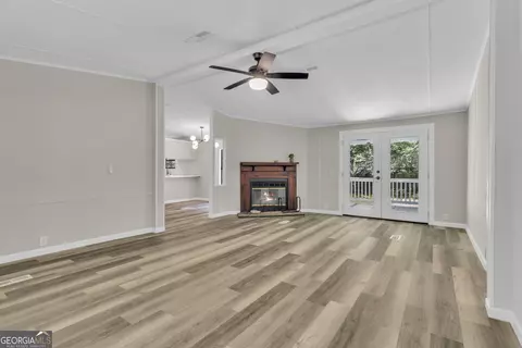 Living - 460 Etheridge Mill Rd, Milner, GA 30257 photo 2 of 5