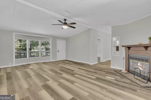 Living - 460 Etheridge Mill Rd, Milner, GA 30257 photo 5 of 5