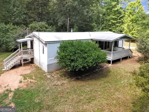 Exterior - 460 Etheridge Mill Rd, Milner, GA 30257 photo 10 of 16