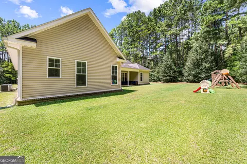 Exterior - 142 Honeysuckle Trce, Cochran, GA 31014 photo 8 of 9