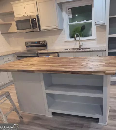 Kitchen - 165 Moss Rd, Covington, GA 30016 photo 1 of 4