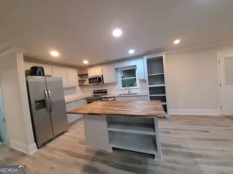 Kitchen - 165 Moss Rd, Covington, GA 30016 photo 2 of 4