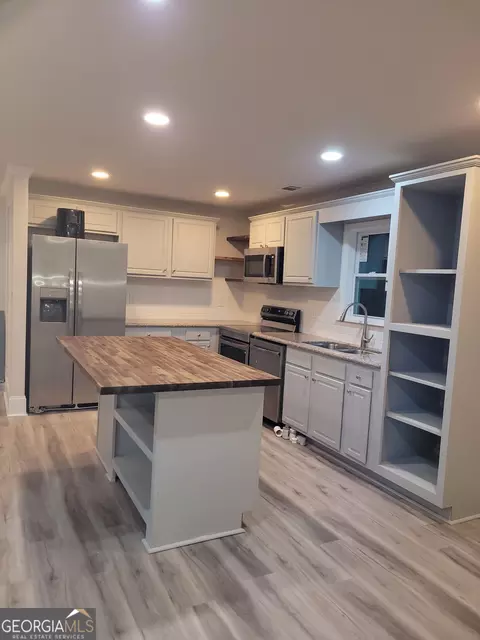 Kitchen - 165 Moss Rd, Covington, GA 30016 photo 3 of 4