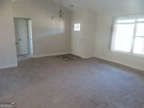 Living - 123 Needleleaf Ct, Barnesville, GA 30204 photo 1 of 1
