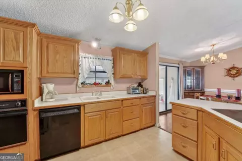 Kitchen - 535 E 1st St, Midway, GA 31320 photo 3 of 4