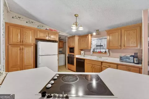 Kitchen - 535 E 1st St, Midway, GA 31320 photo 2 of 4