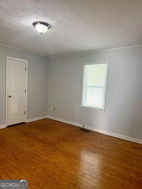 Bedroom - 2402 N Broad St, Commerce, GA 30529 photo 3 of 4