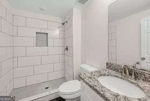 Bath - 134 E 5th St, Monroe, GA 30655 photo 2 of 5