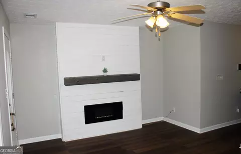 Living - 6218 Avery St SW, Covington, GA 30014 photo 3 of 5