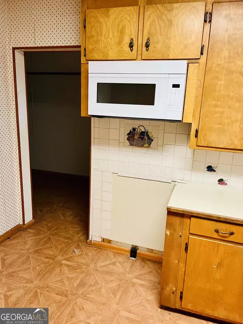 Kitchen - 6 N Spring St, Claxton, GA 30417 photo 2 of 4