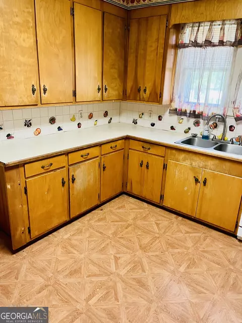 Kitchen - 6 N Spring St, Claxton, GA 30417 photo 3 of 4