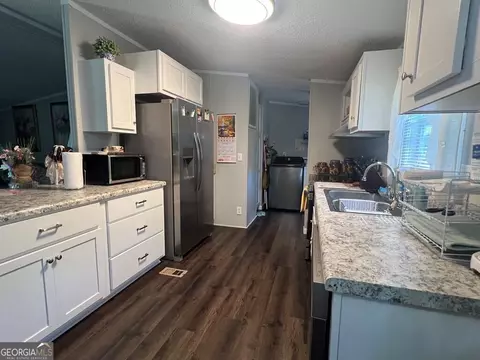 Kitchen - 166 Pebble Hills Rd, Cochran, GA 31014 photo 2 of 3