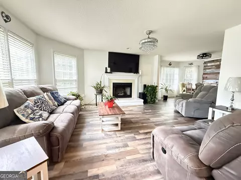 Living - 308 Regal Way E, Mcdonough, GA 30253 photo 1 of 3