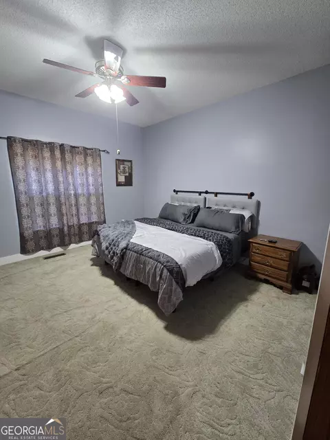 Bedroom - 1277 Bob Hammond Rd, Dublin, GA 31021 photo 5 of 6