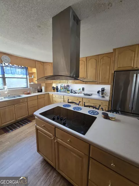 Kitchen - 1277 Bob Hammond Rd, Dublin, GA 31021 photo 3 of 3
