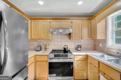 Kitchen - 80 Berkshire Keep, Covington, GA 30016 photo 6 of 7