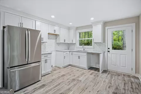 Kitchen - 9244 Nelson Dr SW, Covington, GA 30014 photo 1 of 2
