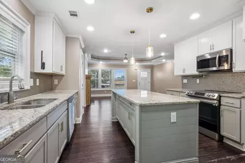 Kitchen - 112 E Stephens St, Winder, GA 30680 photo 2 of 4