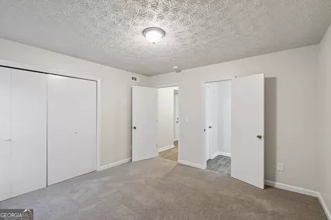 Bedroom - 587 Farmbrook Trl NE, Kennesaw, GA 30144 photo 2 of 6