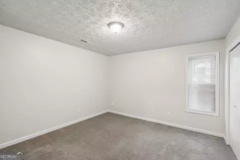 Bedroom - 587 Farmbrook Trl NE, Kennesaw, GA 30144 photo 1 of 6
