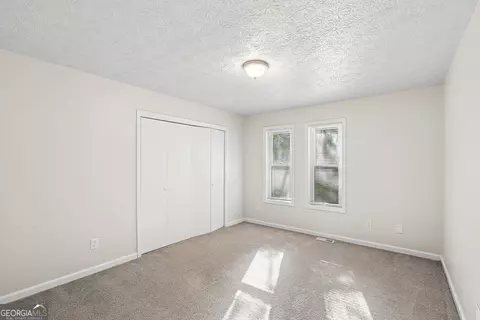 Bedroom - 587 Farmbrook Trl NE, Kennesaw, GA 30144 photo 3 of 6
