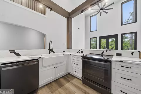 Kitchen - 391 Parker Rd, Covington, GA 30014 photo 2 of 3
