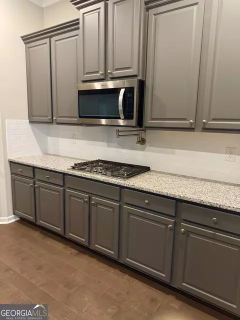 Kitchen - 312 Basel Way, Hampton, GA 30228 photo 2 of 5