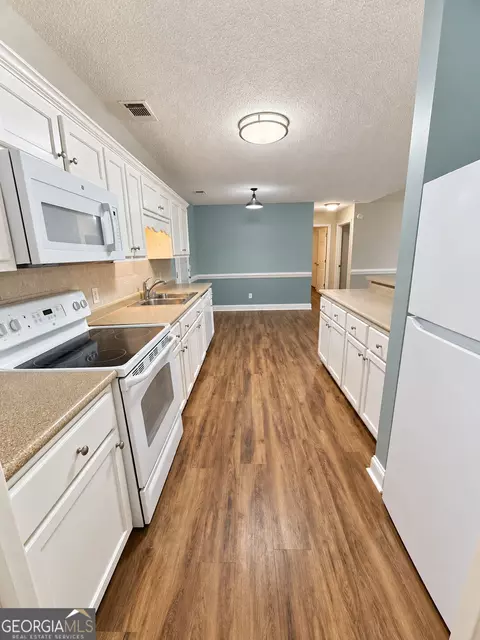 Kitchen - 130 Pine St, Pulaski, GA 30451 photo 2 of 2