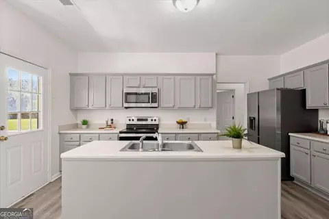 Kitchen - 125 Kevins Dr, Hampton, GA 30228 photo 2 of 4