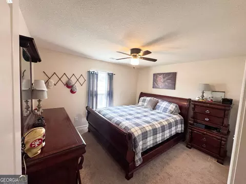 Bedroom - 10783 Wheeler Trce, Hampton, GA 30228 photo 3 of 6