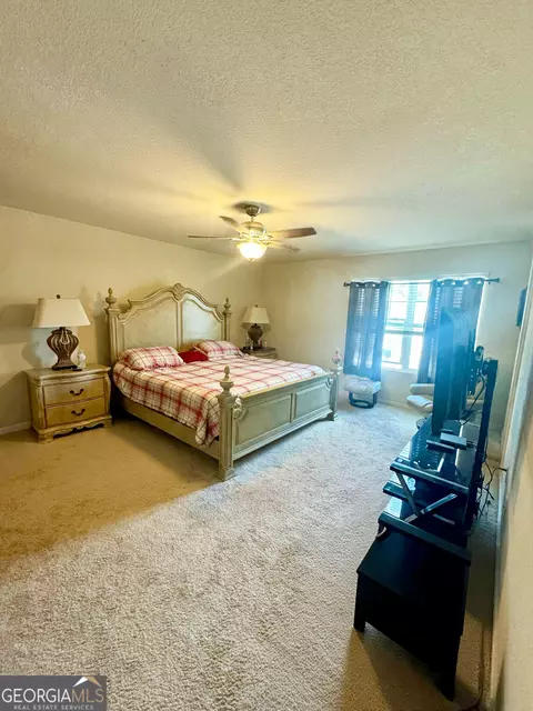 Bedroom - 10783 Wheeler Trce, Hampton, GA 30228 photo 1 of 6