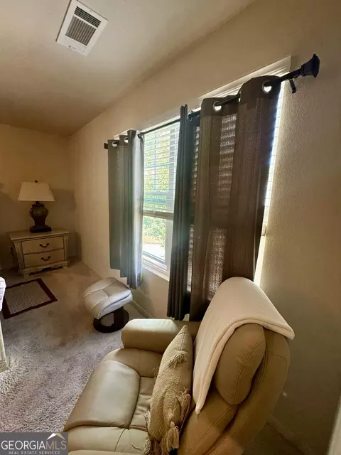 Bedroom - 10783 Wheeler Trce, Hampton, GA 30228 photo 5 of 6