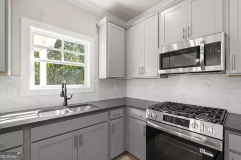Kitchen - 4290 Brookhaven Dr SE, Covington, GA 30014 photo 3 of 4